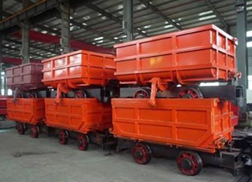 Do You Know The Advantages And Working Principle Of The Single Side Curved Track Side Dumping Mine Car?
